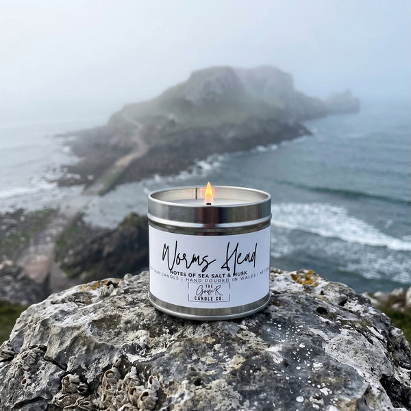 Worms Head soy candle in a brushed tin with notes of sea salt and musk, hand-poured in Wales by The Gower Candle Co.