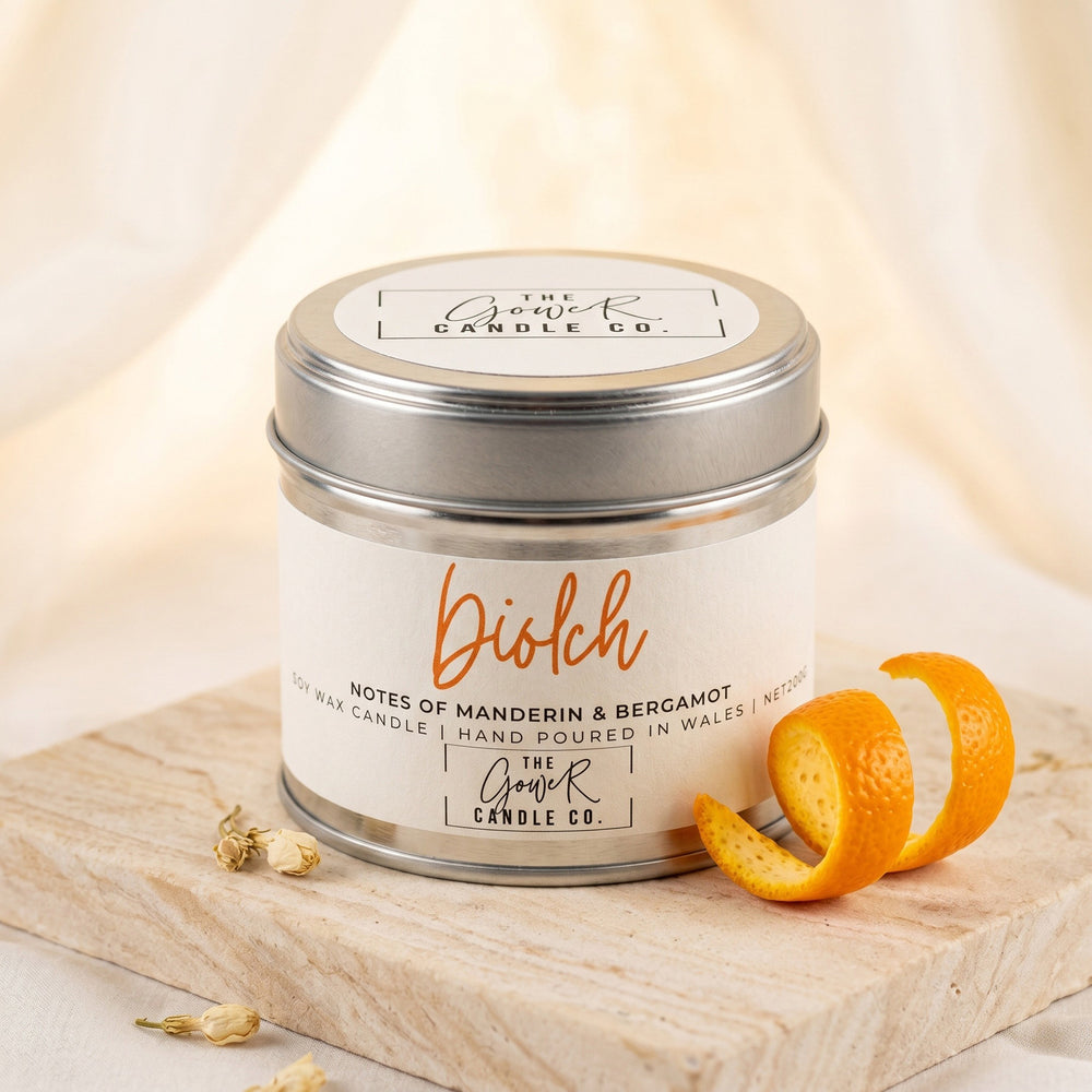 Diolch soy candle in a brushed tin with notes of mandarin and bergamot, hand-poured in Wales by The Gower Candle Co.