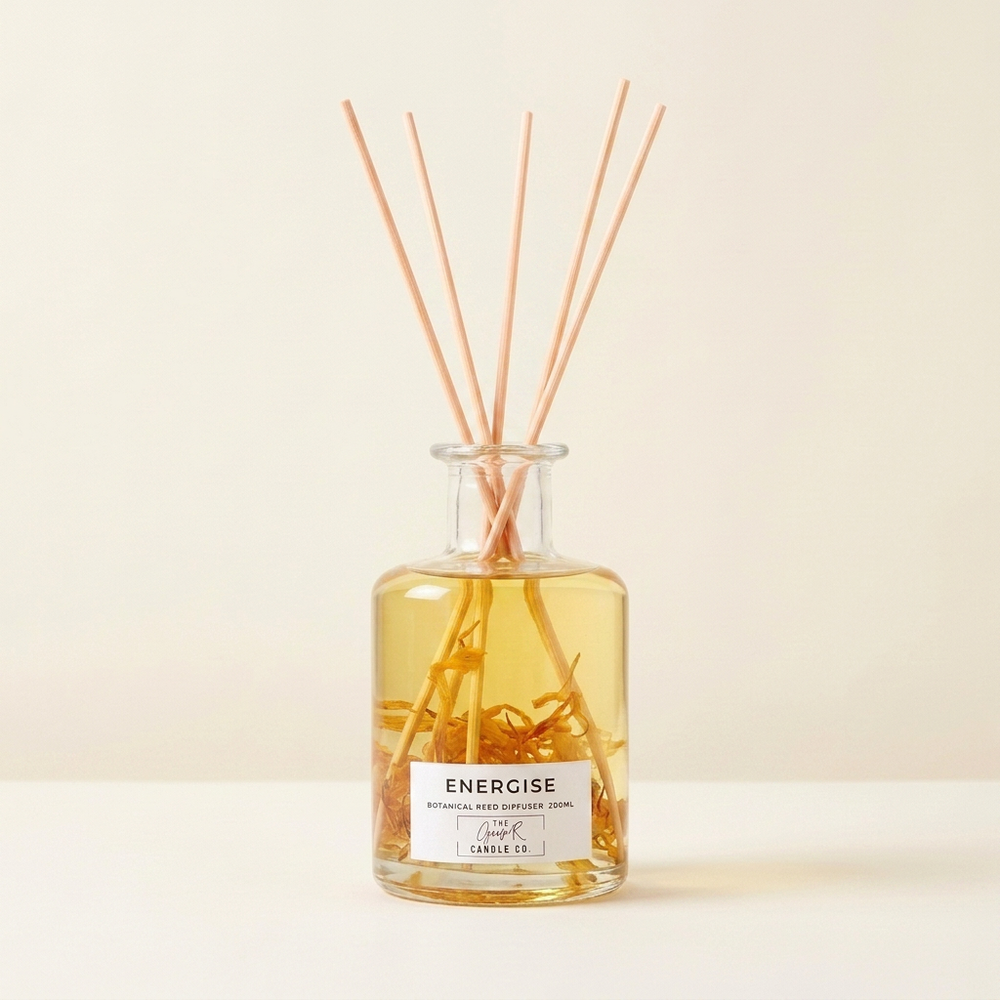Energise Botanical Reed Diffuser 200ml by The Gower Candle Co. with amber petals