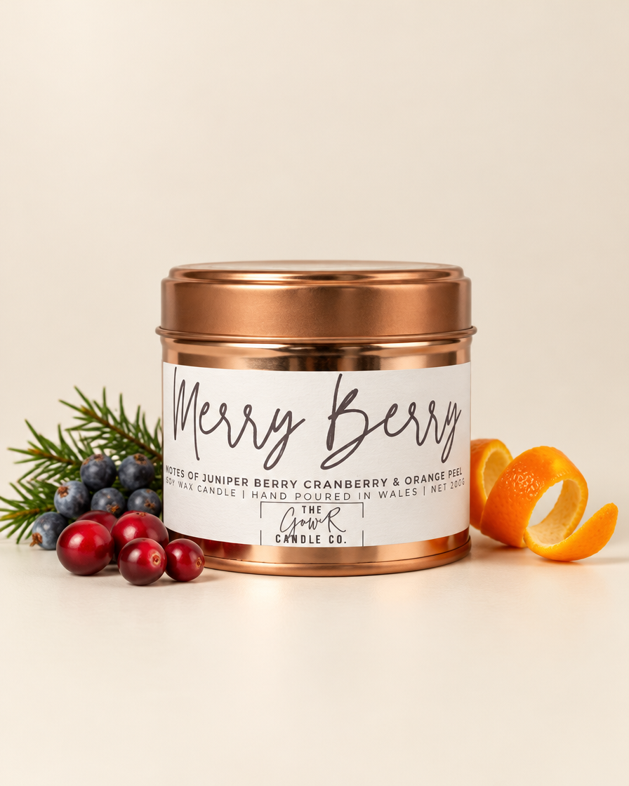 Merry Berry rose gold soy candle by The Gower Candle Co. with cranberries, juniper and orange peel