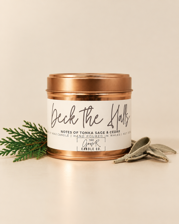 Deck the Halls rose gold soy candle by The Gower Candle Co. with cedar and sage