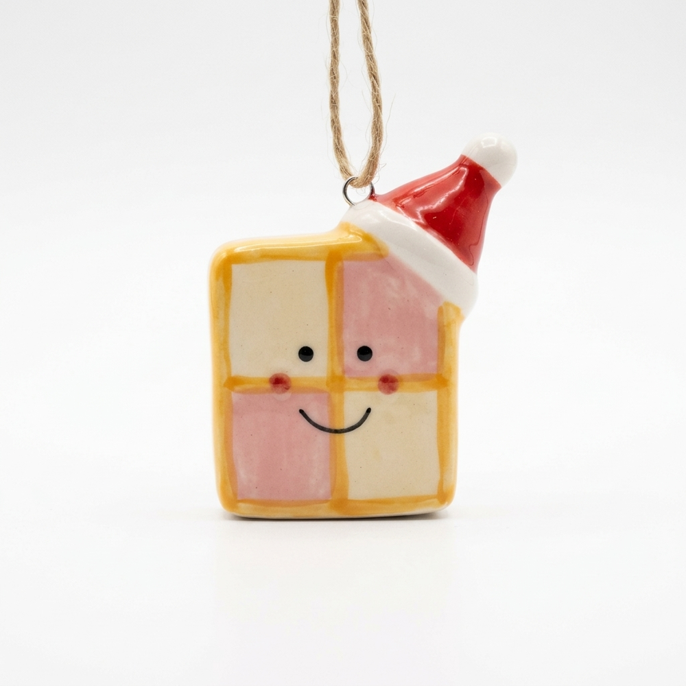 Ceramic Battenberg Cake Christmas Decoration on a white background