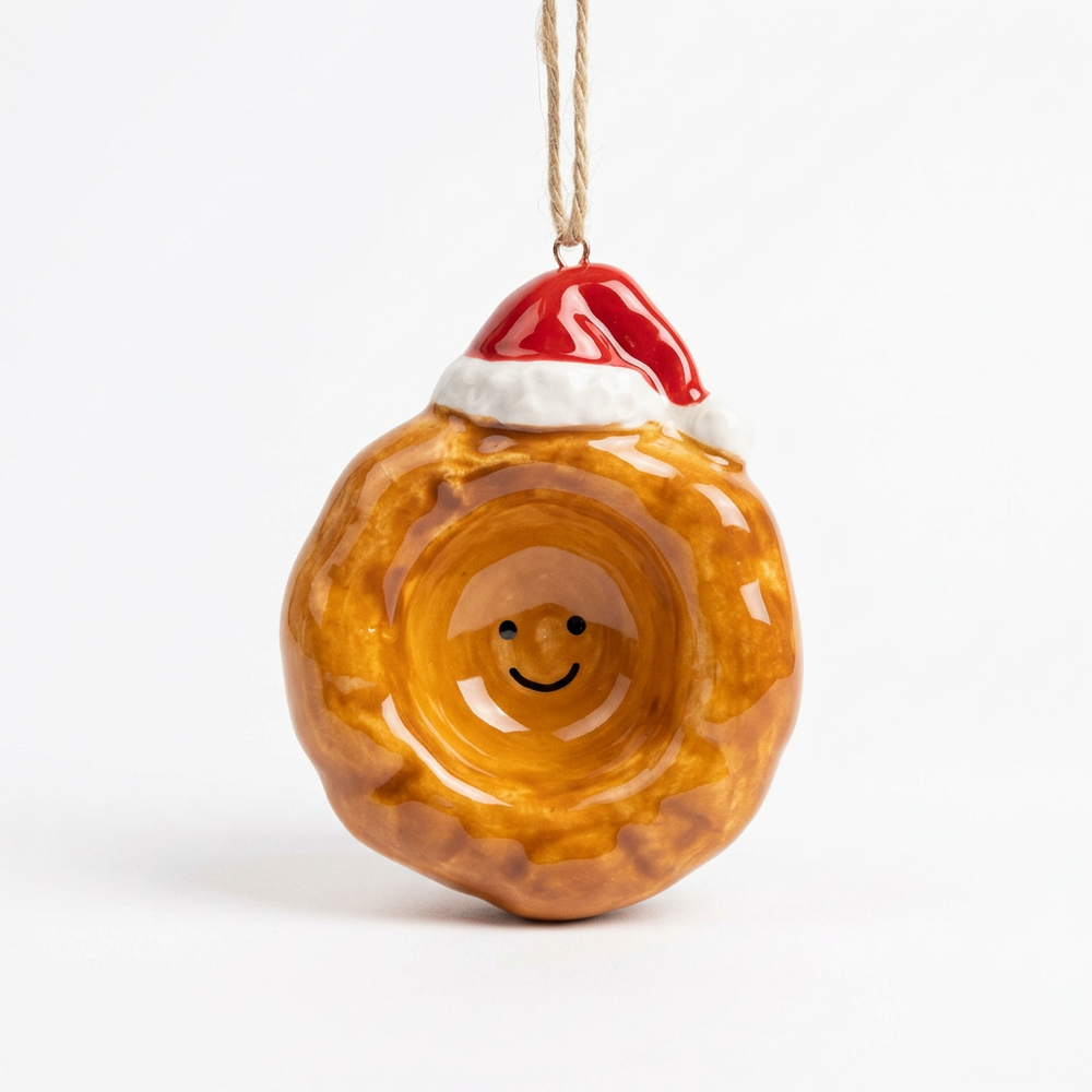 Ceramic Yorkshire Pudding Christmas Decoration on a white background