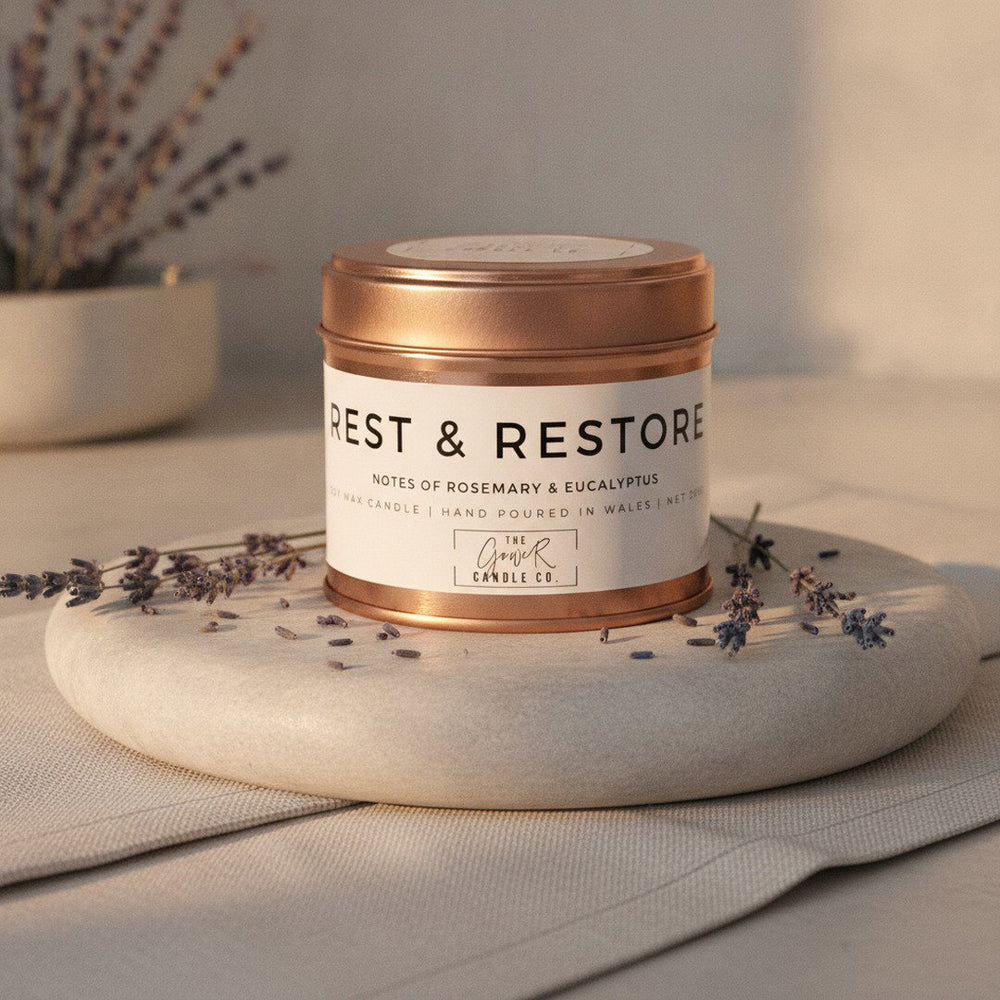 Rest & Restore Rose Gold Soy Candle by The Gower Candle Co. with dried lavender stems and soft linen