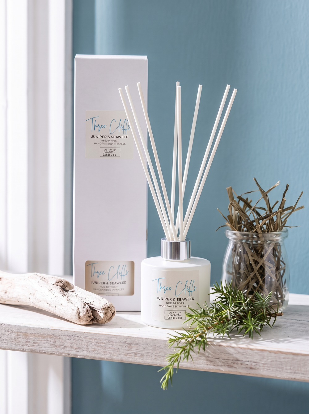 Three Cliffs reed diffuser with reed sticks, juniper and seaweed scent, by The Gower Candle Co.