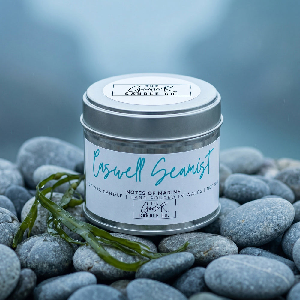 Caswell Seamist soy candle in a brushed tin with fresh marine notes, hand-poured in Wales by The Gower Candle Co.