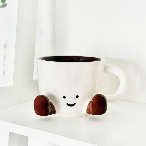 Coffee Cuddles Mug, ceramic mug with face and legs