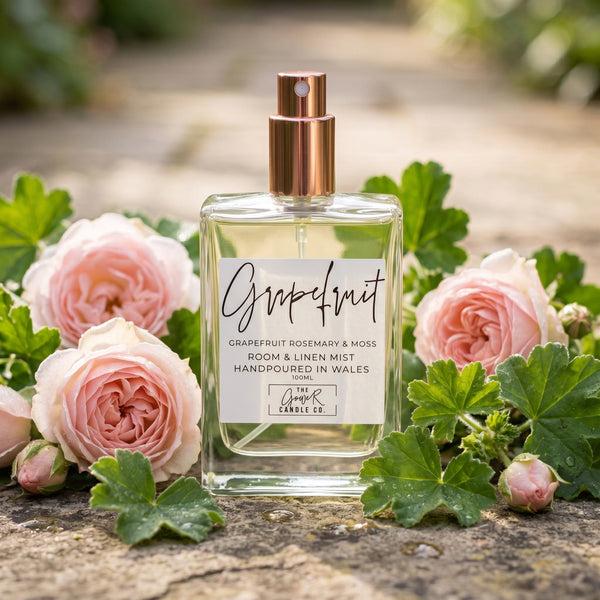 Grapefruit room spray bottle with rose gold lid, pink grapefruit and citrus scent, by The Gower Candle Co.