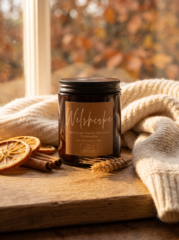 Welshcake candle styled in a cosy autumn window scene