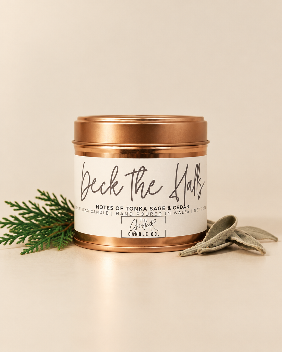 Deck the Halls rose gold soy candle by The Gower Candle Co. with cedar and sage