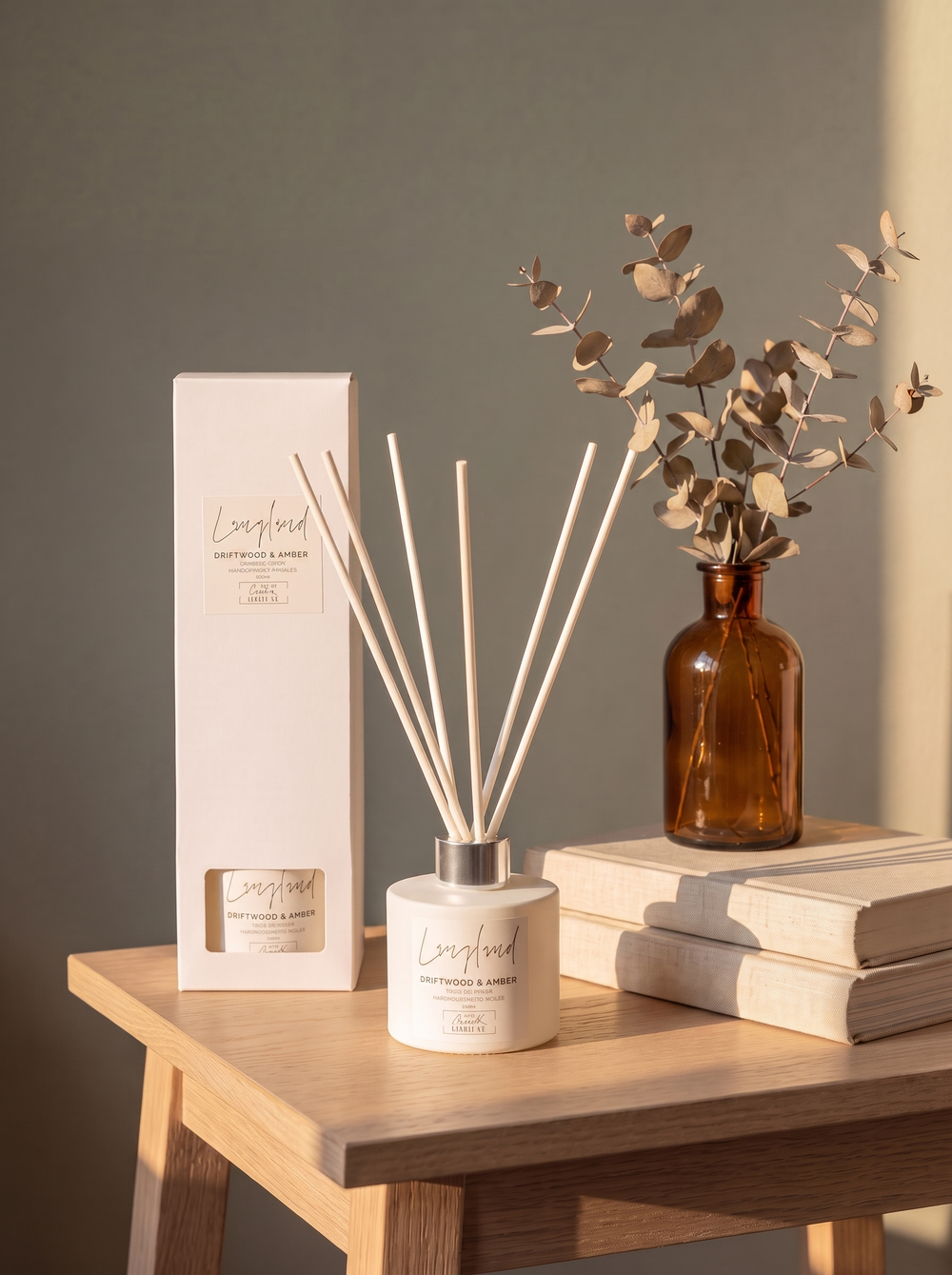 Langland reed diffuser with reed sticks, driftwood and amber scent, by The Gower Candle Co.
