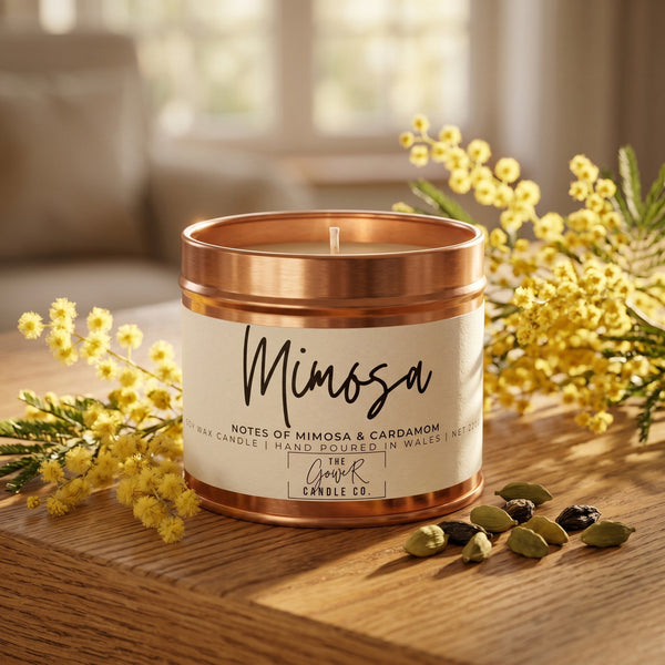 Mimosa soy candle in a reusable tin, mimosa blossom and golden nectar scent, by The Gower Candle Co.
