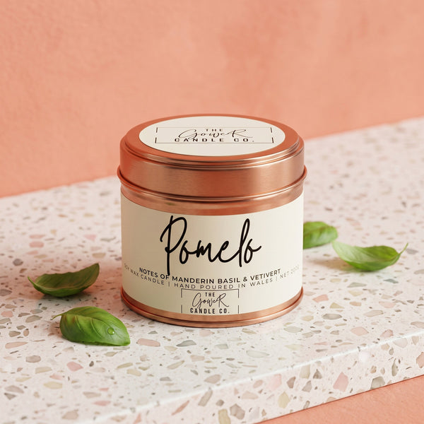 Pomelo soy candle in a reusable tin, pomelo and white blossom scent, by The Gower Candle Co.